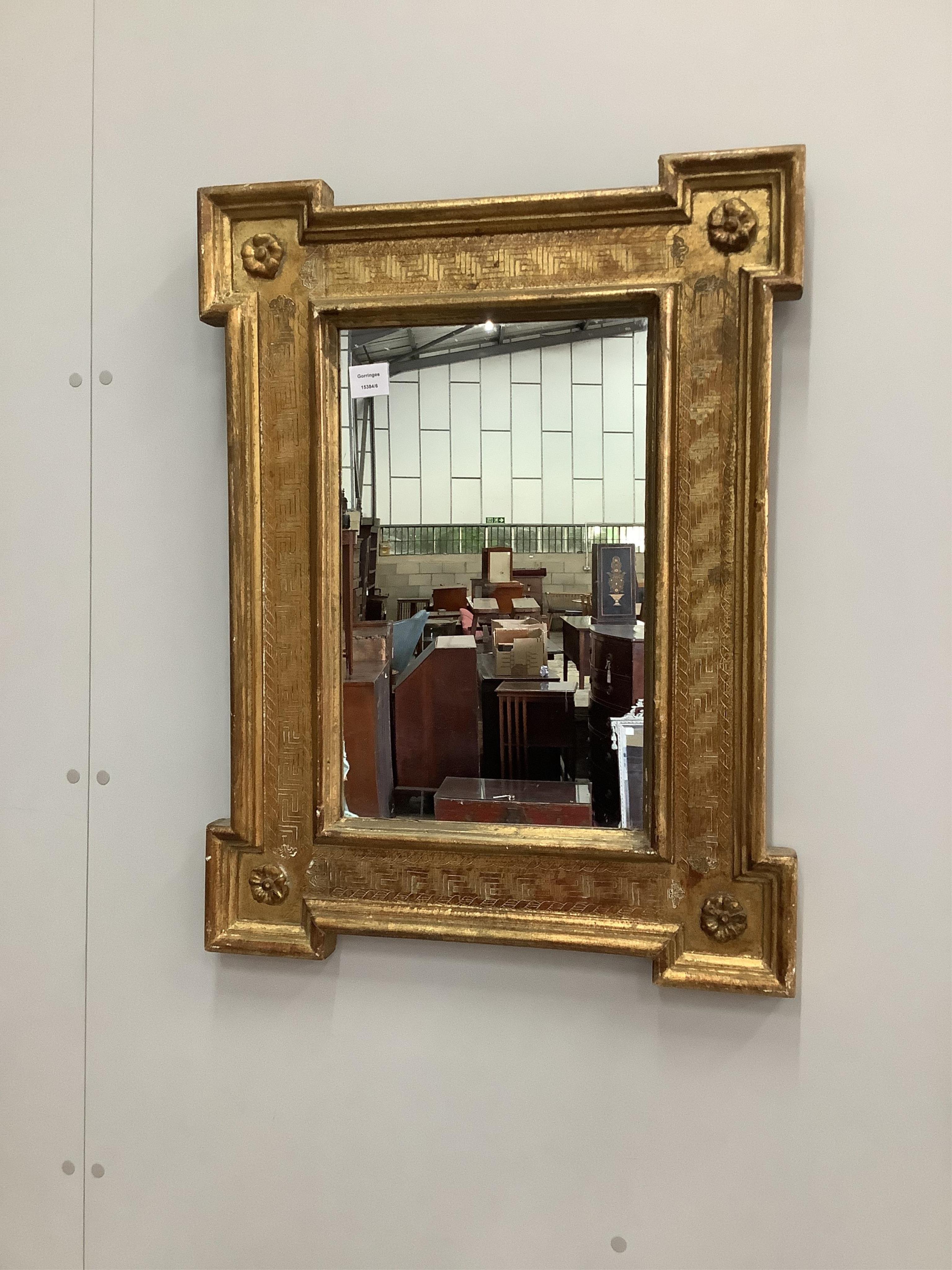 A rectangular Regency style giltwood and composition wall mirror, width 59cm, height 78cm. Condition - fair